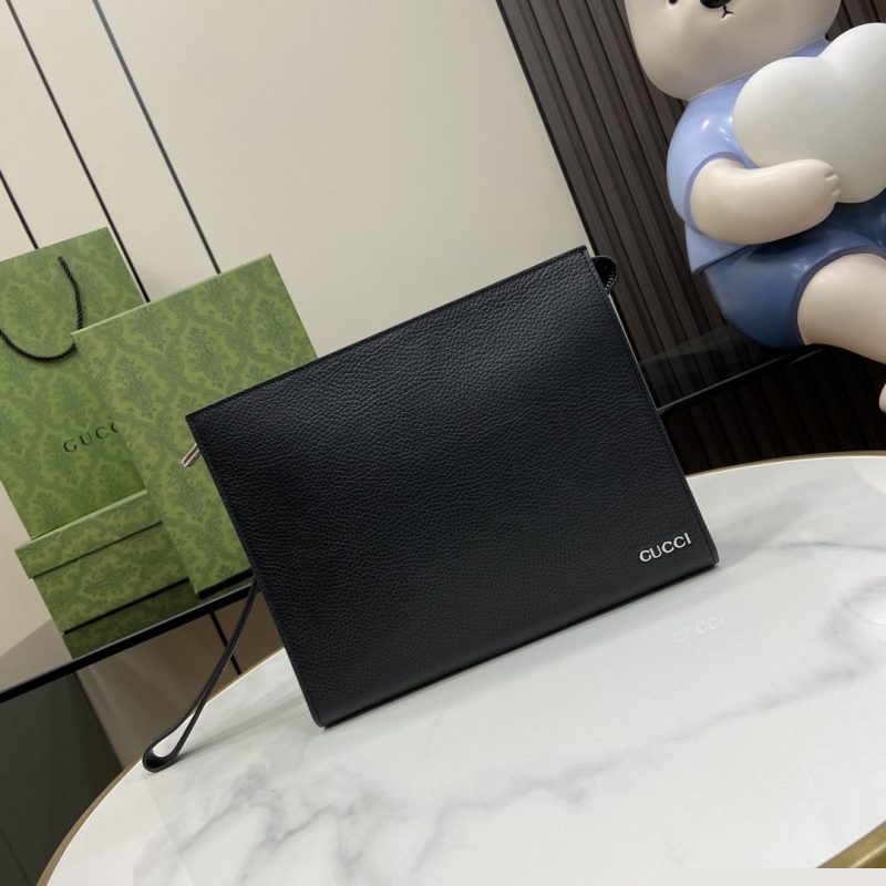 G*u*i clutch bags